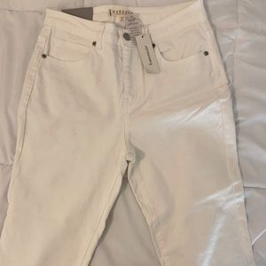 Francesca’s white denim jeans